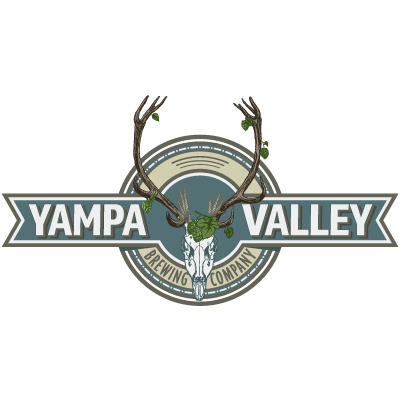 Yampa Valley Brewing lit up at night time with patrols on the patio.