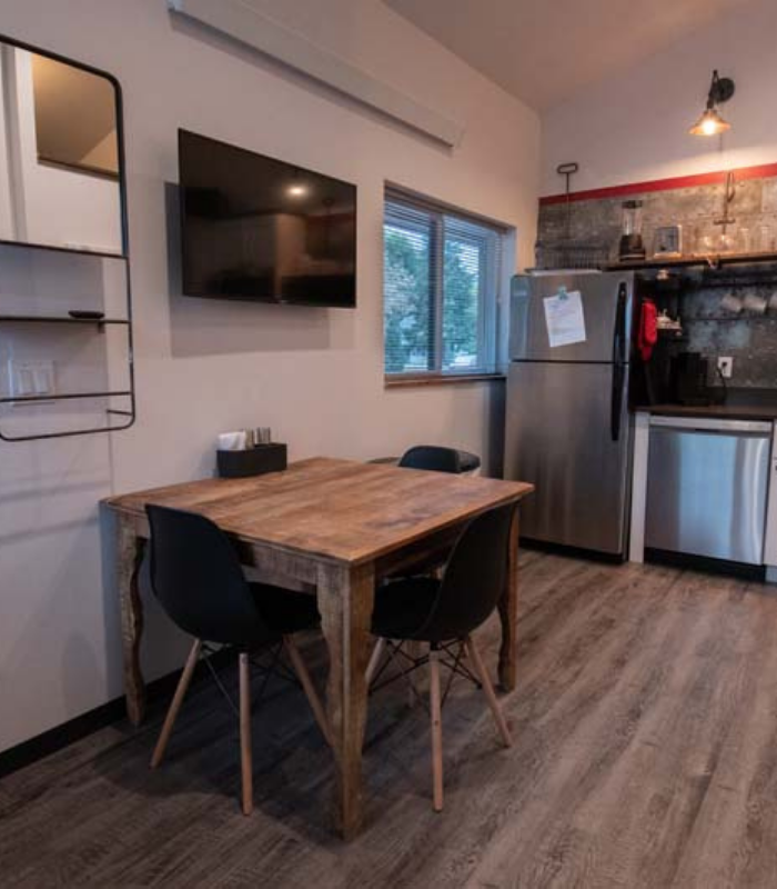 Detailed shot of expresso machine brewing expresso at the Wild Good Coffee shop.