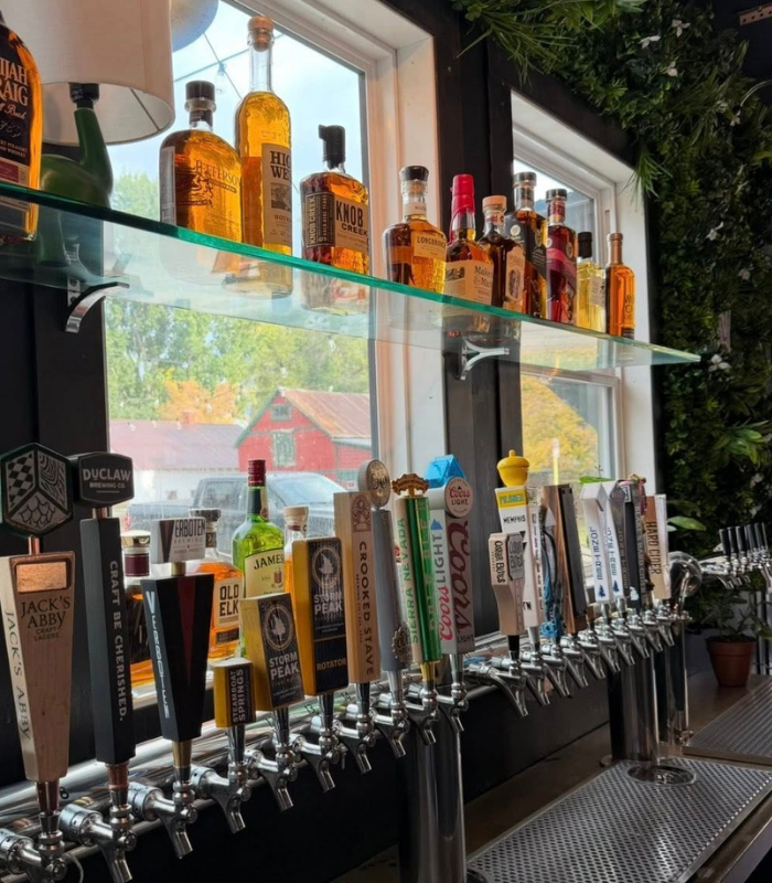 Detailed shot of expresso machine brewing expresso at the Wild Good Coffee shop.